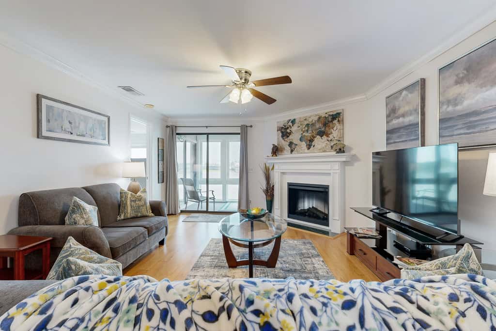 Elegant riverfront condo with access to private W/D, central AC, and pool access