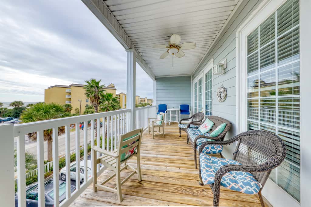 Second-level beachfront villa w/ shared pool, ocean views, & balcony