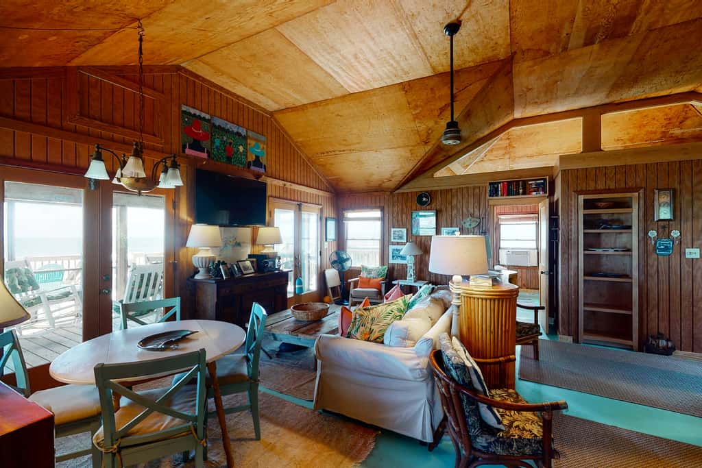 Rustic oceanfront home with screened porch, free WiFi, deck, & beach access