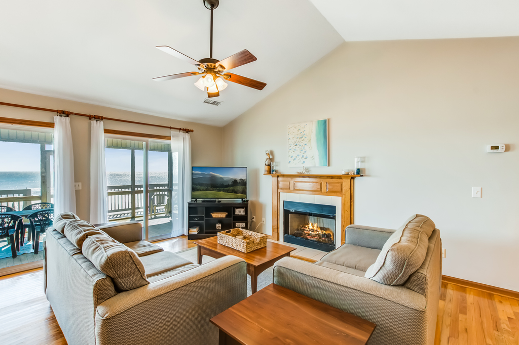 Oceanfront home with private beach access, screened porch & large deck