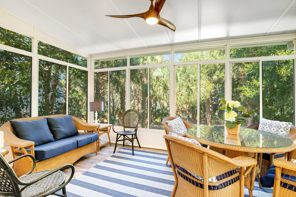 Palmetto-lined home with porches, yard & hammock - walk to beach/town