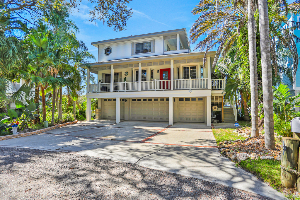 Luxurious waterfront home with pool game room dock