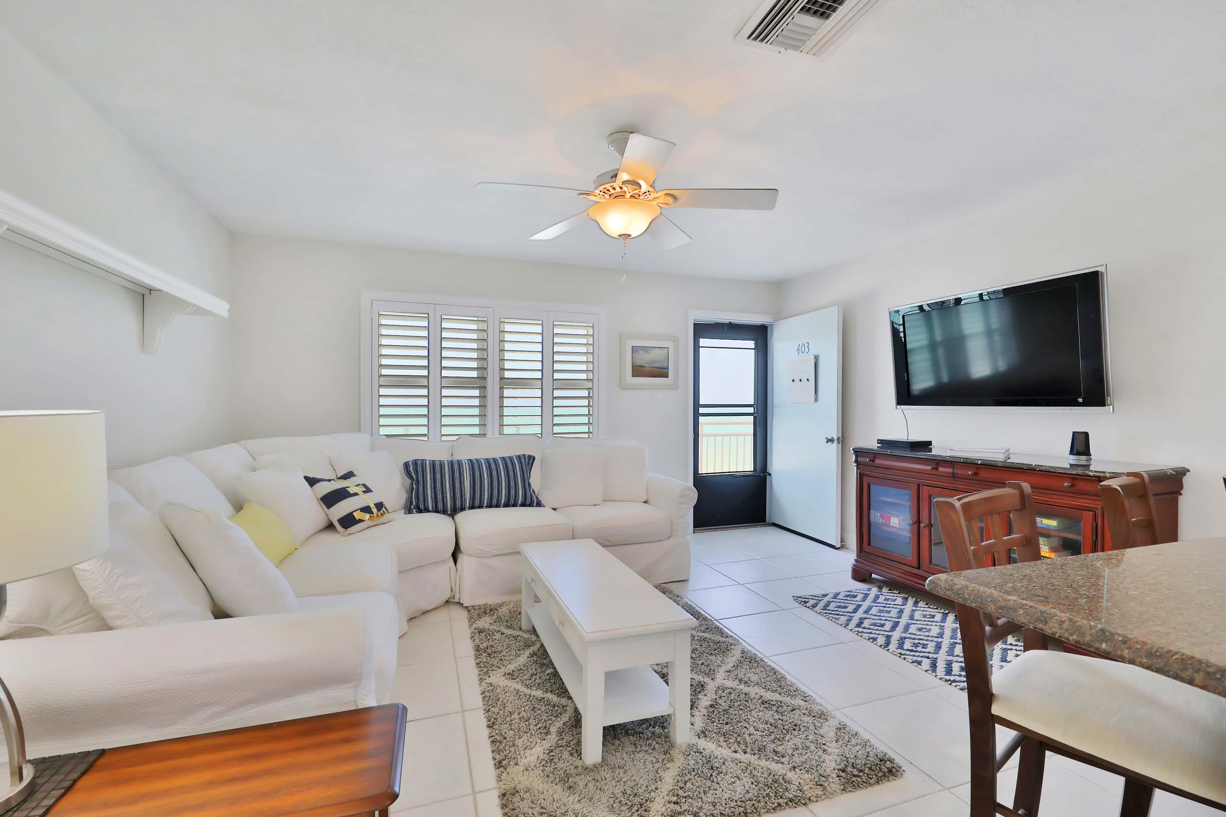 Bright Gulf front condo just steps from the beach