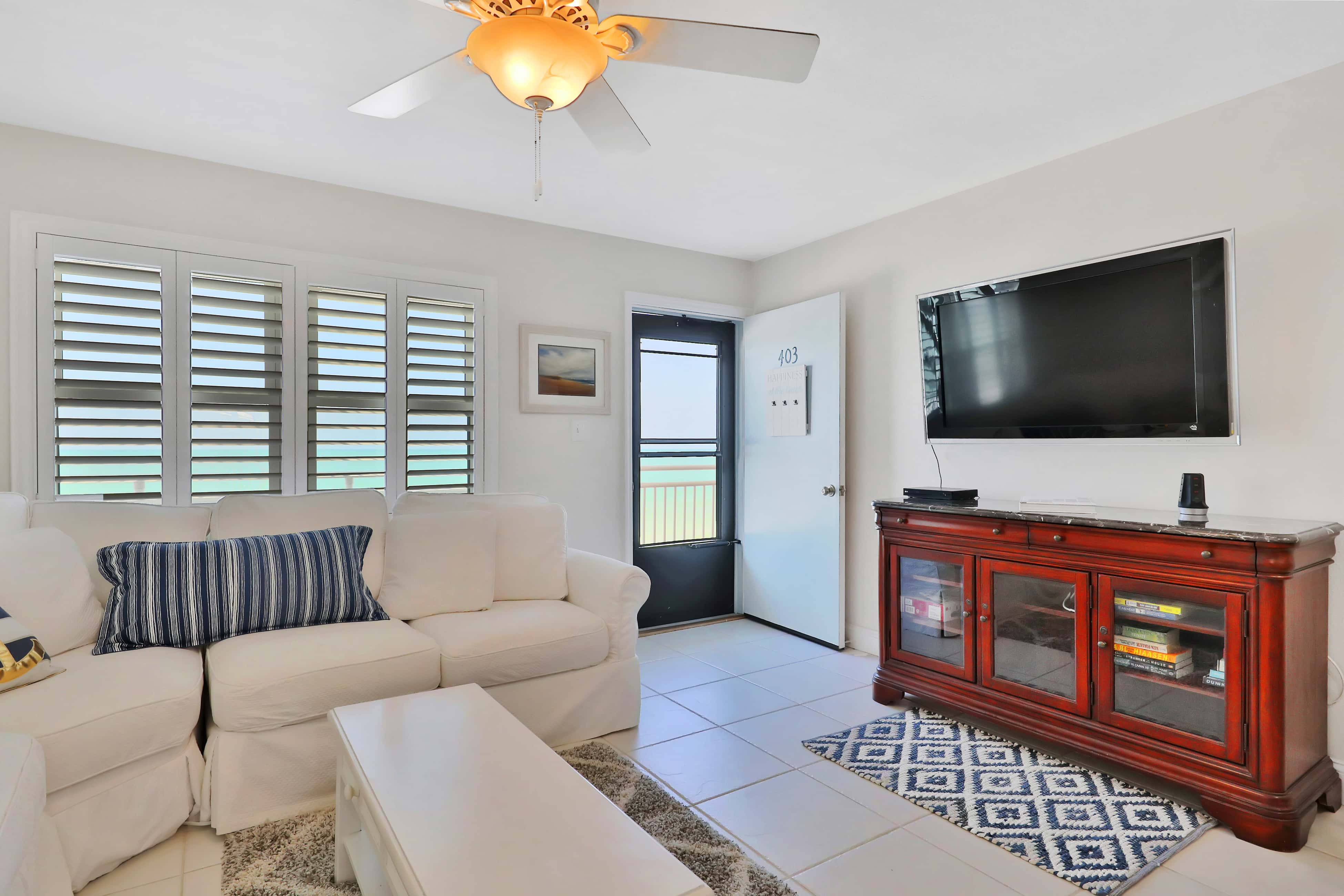 Bright Gulf front condo just steps from the beach