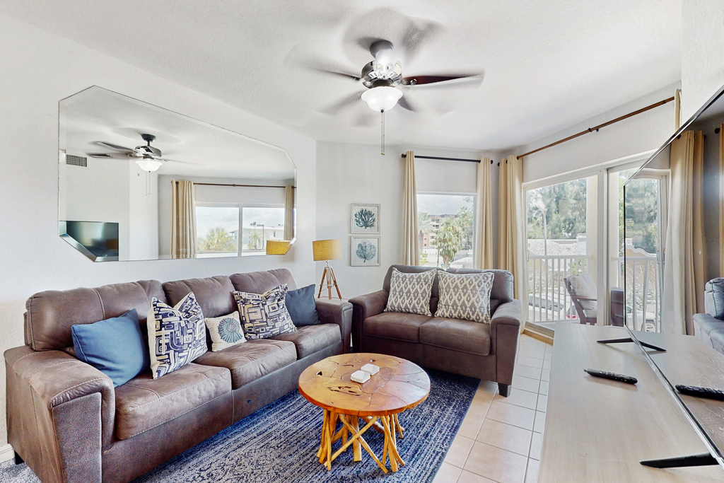 Second floor condo with beach access balcony pool hot tubs and ping pong
