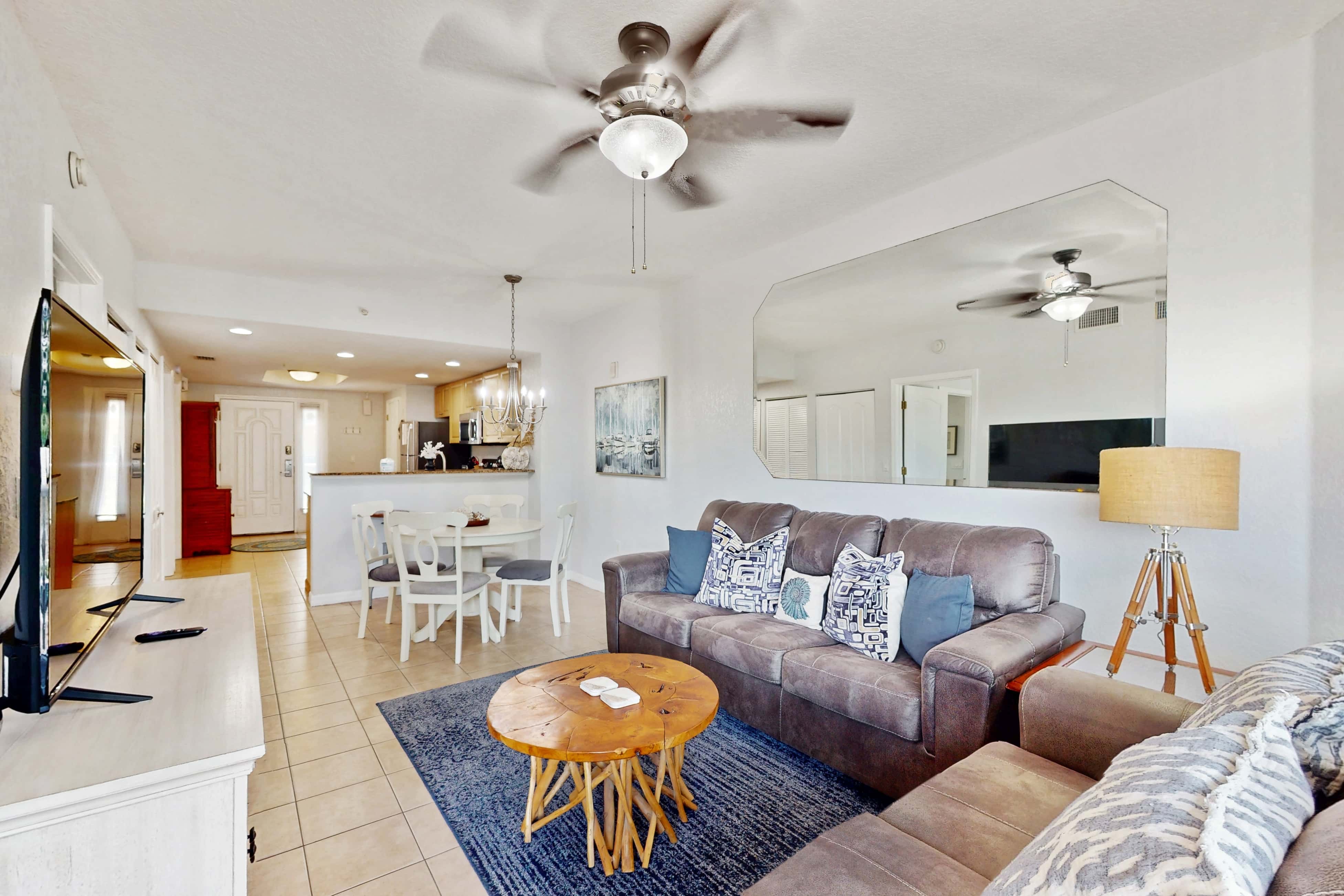 Second floor condo with beach access balcony pool hot tubs and ping pong
