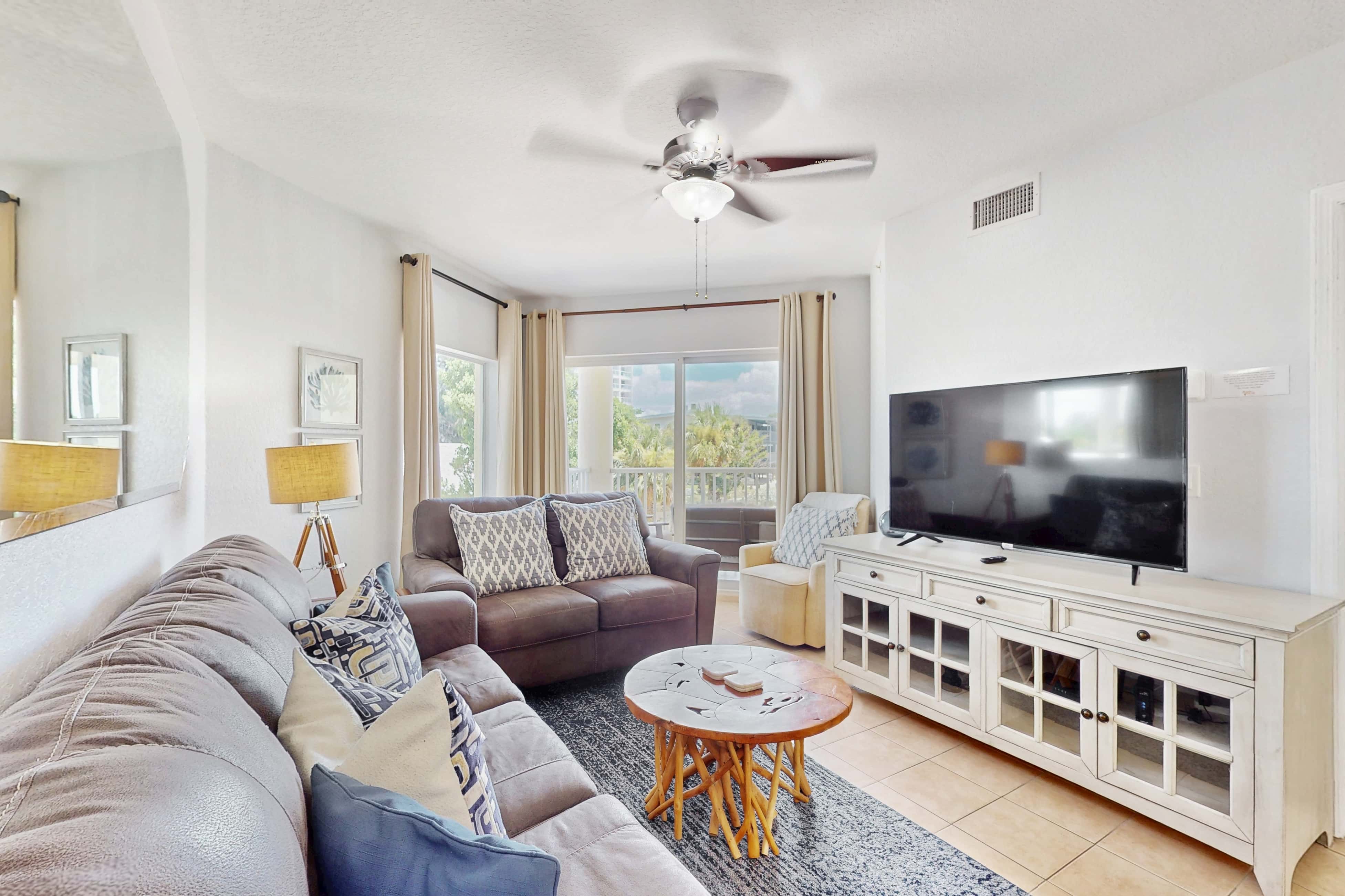 Second floor condo with beach access balcony pool hot tubs and ping pong