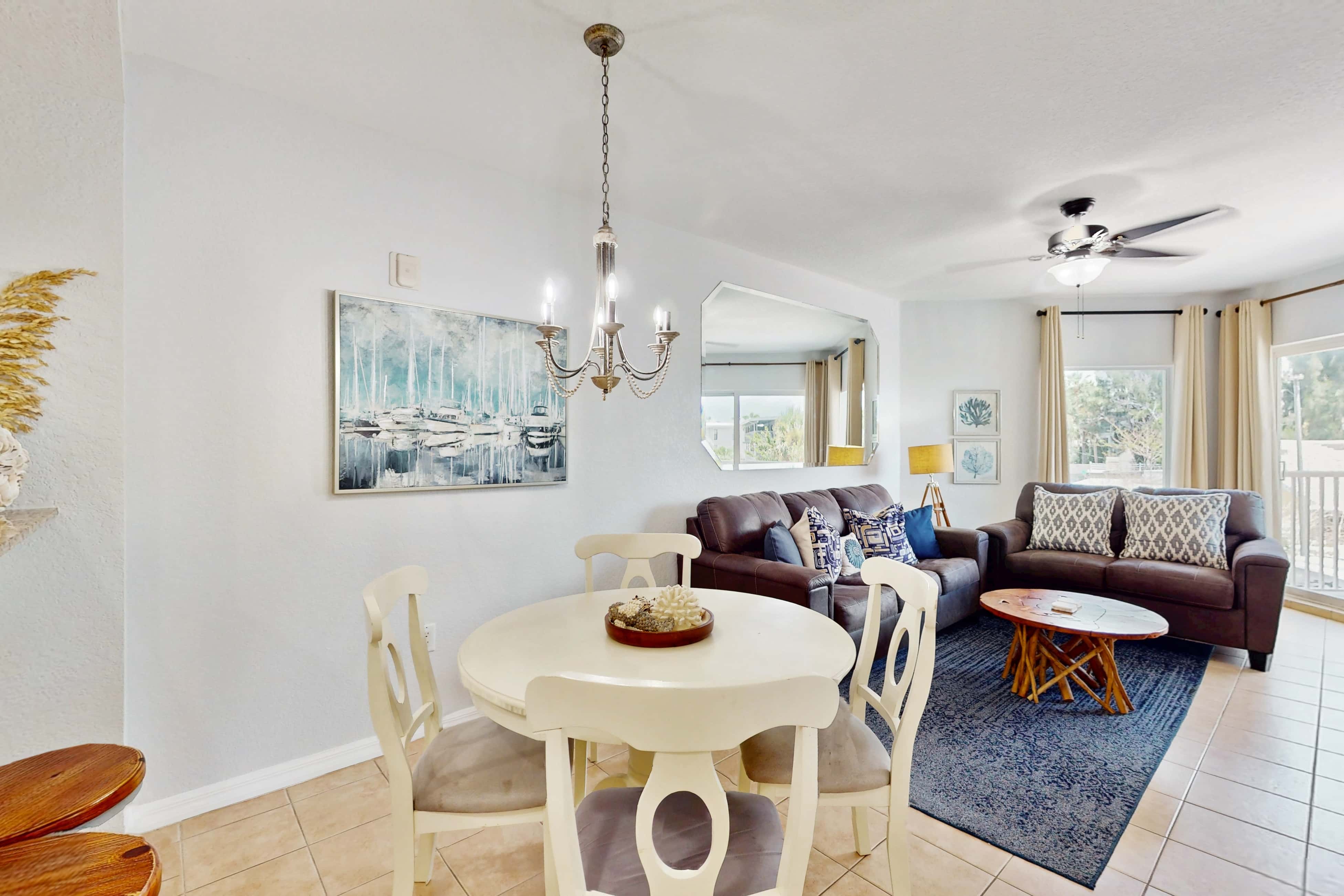 Second floor condo with beach access balcony pool hot tubs and ping pong