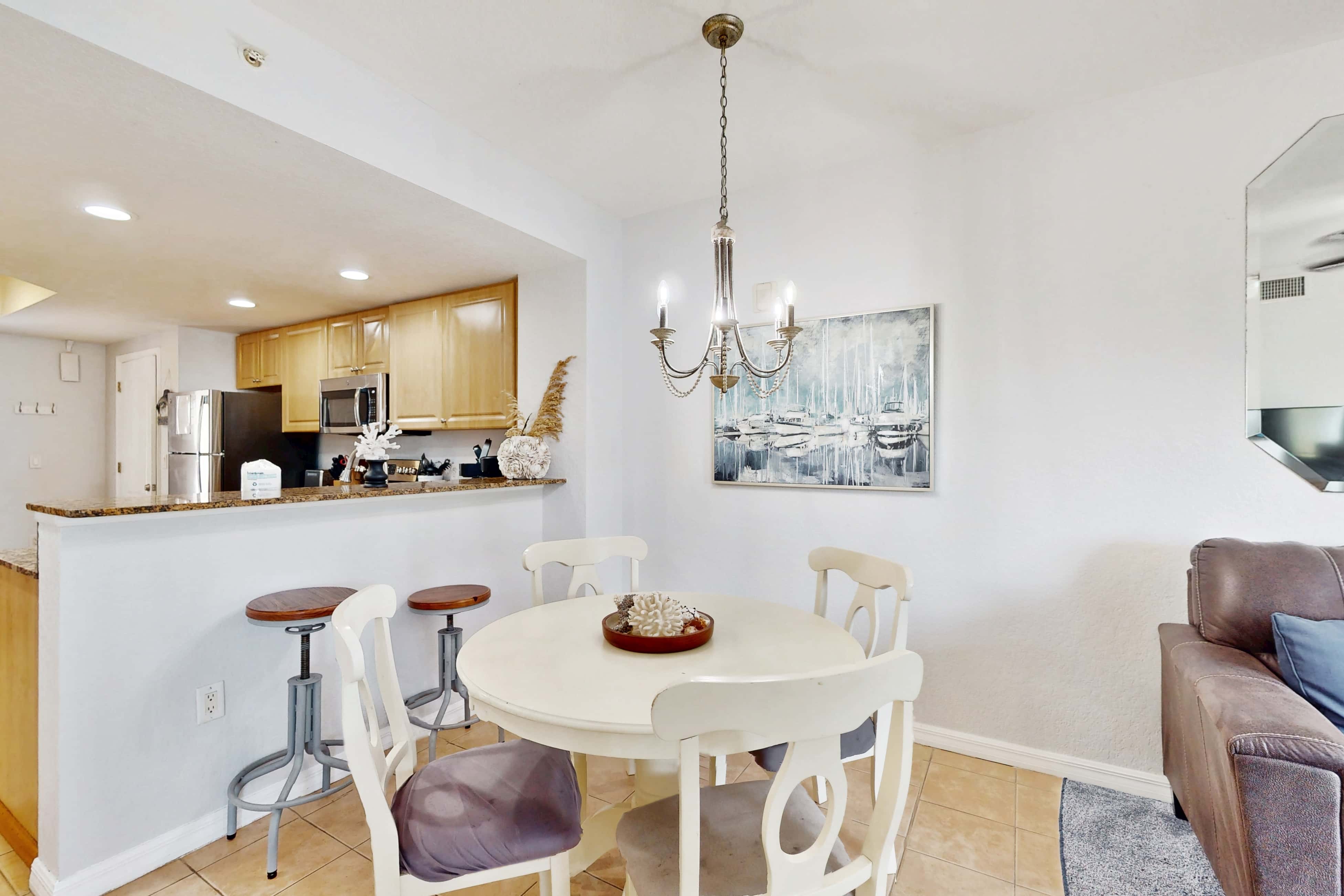 Second floor condo with beach access balcony pool hot tubs and ping pong