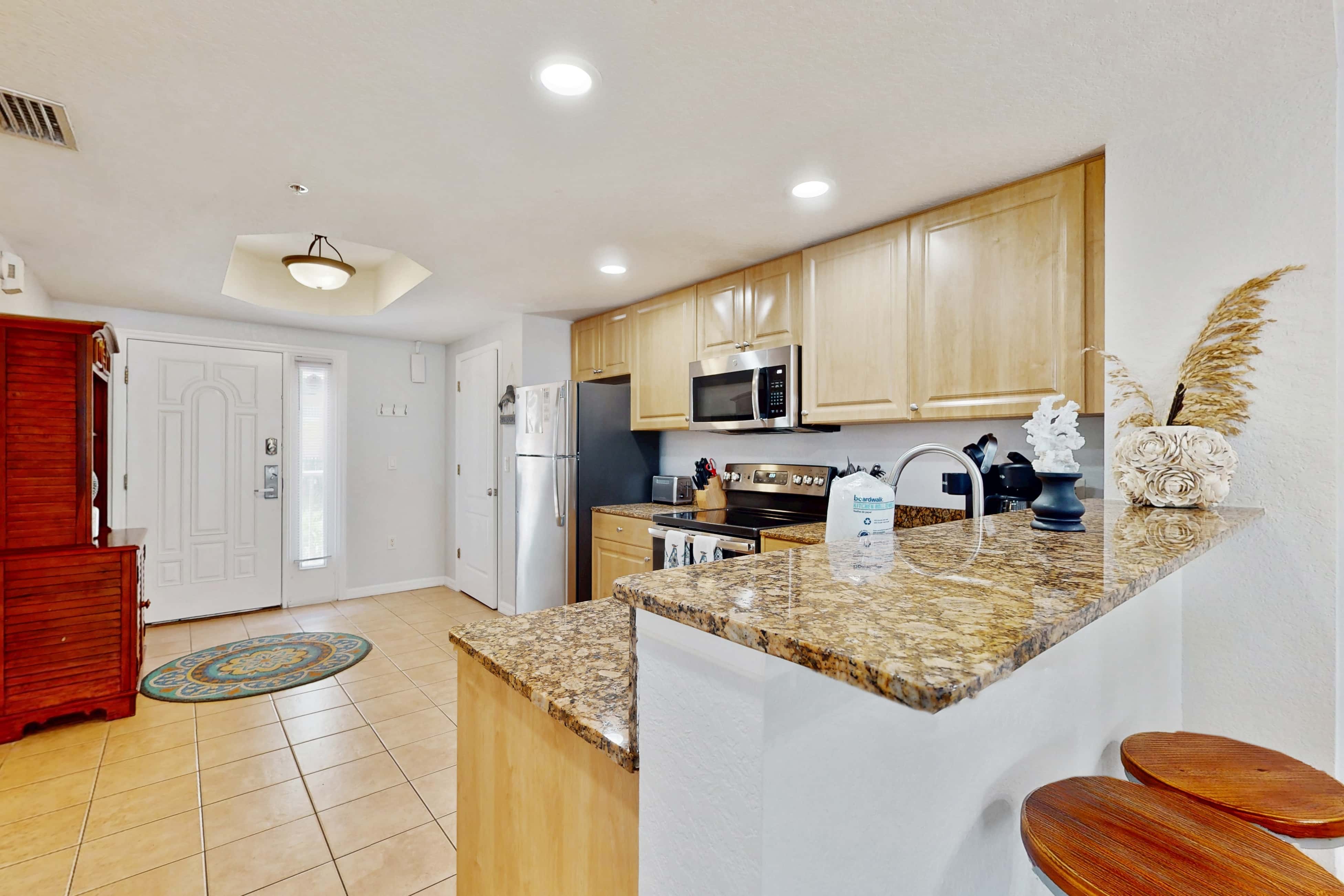 Second floor condo with beach access balcony pool hot tubs and ping pong