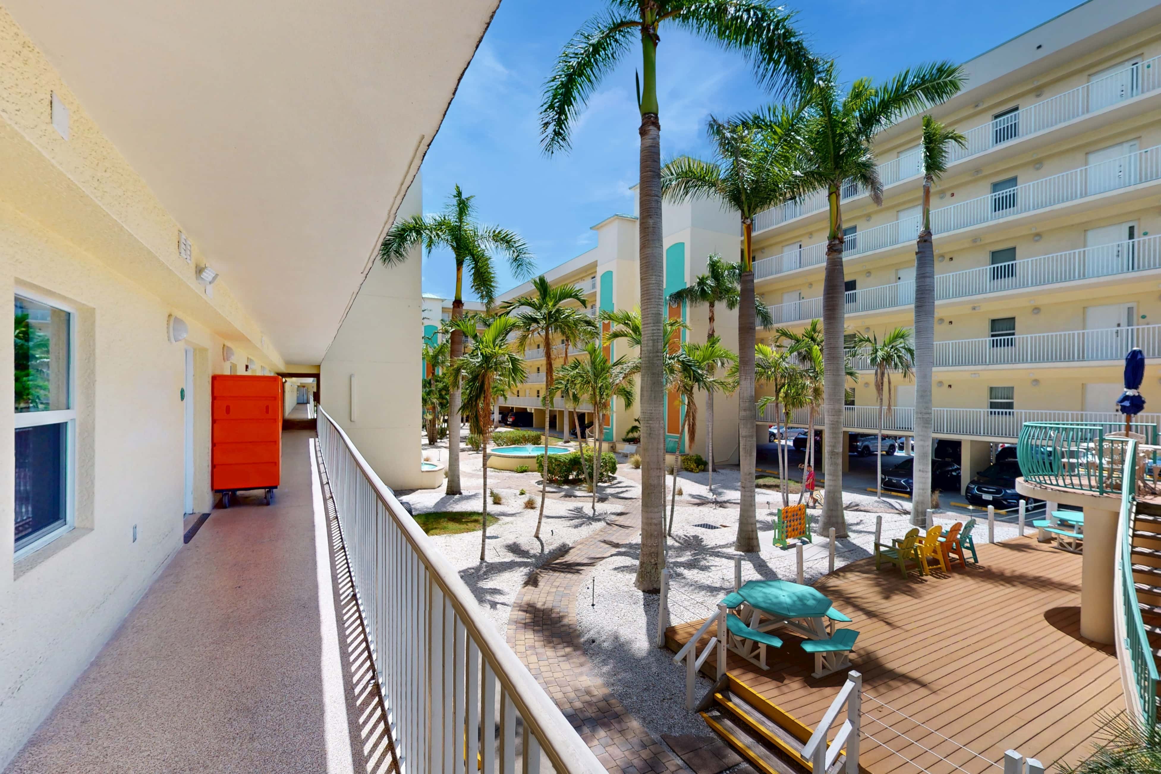 Second floor condo with beach access balcony pool hot tubs and ping pong