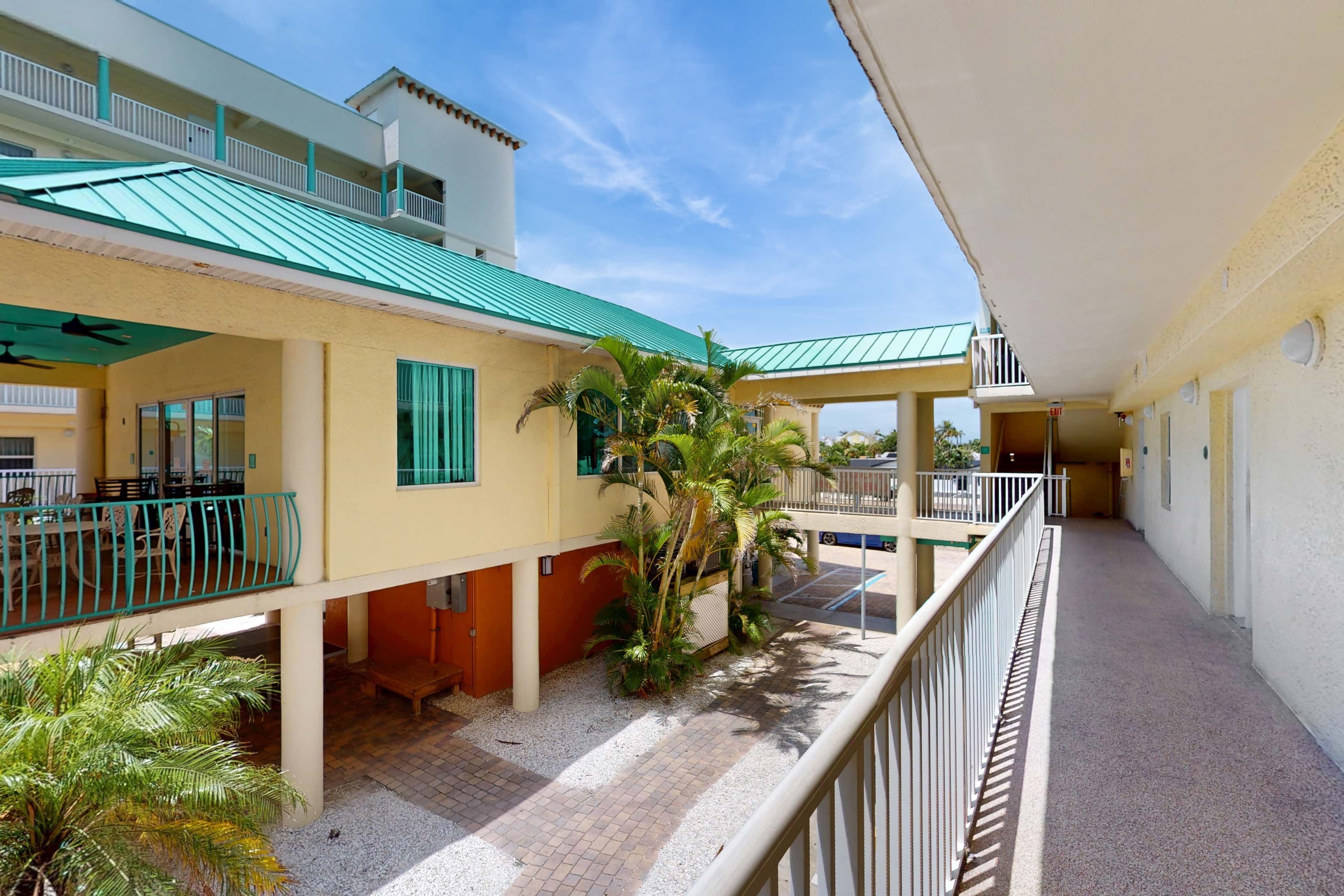 Second floor condo with beach access balcony pool hot tubs and ping pong