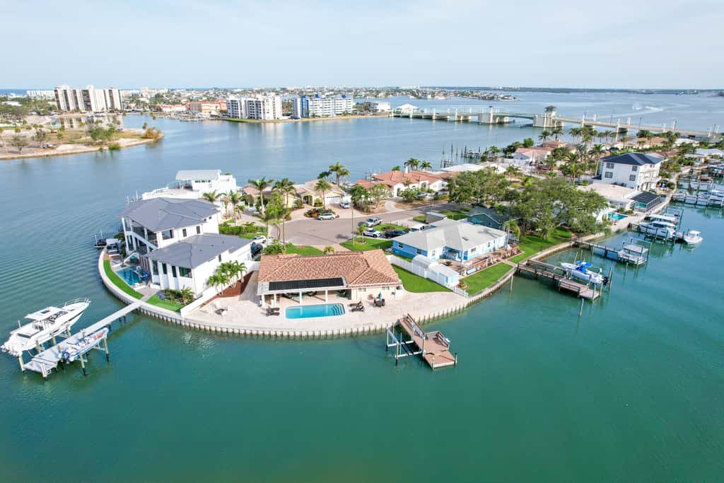 Chic waterfront retreat with private pool and outdoor kitchen near the beach