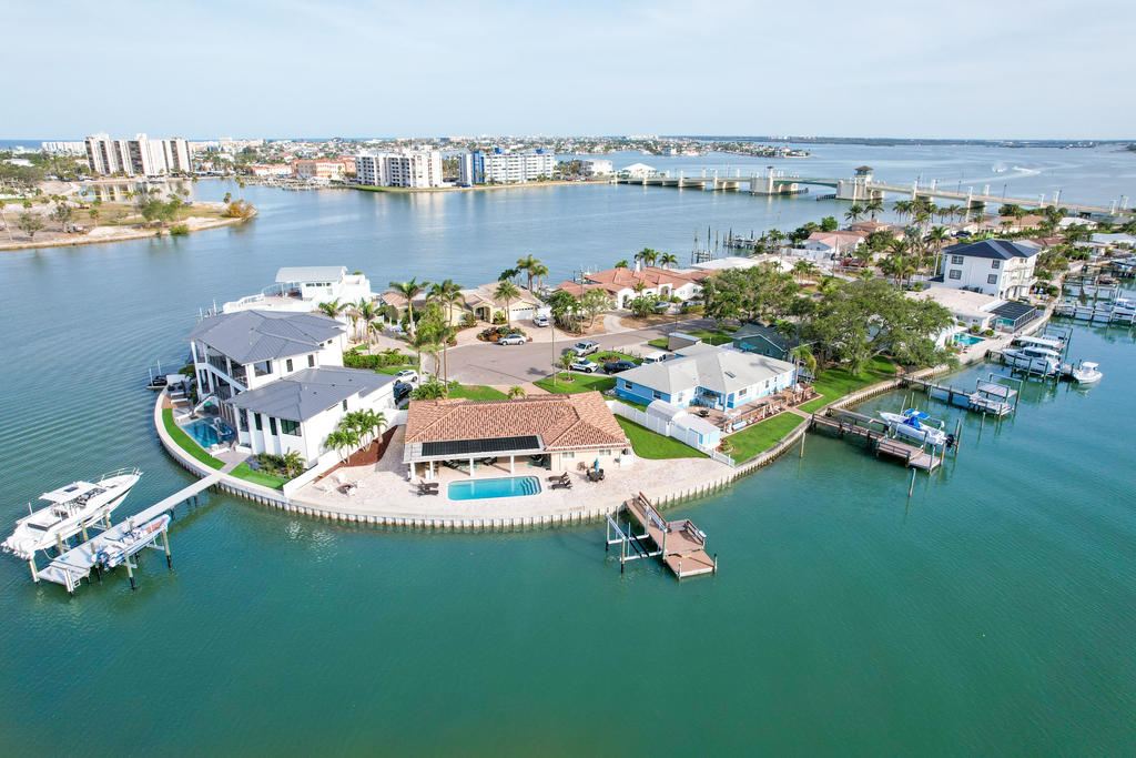 Chic waterfront retreat with private pool and outdoor kitchen near the beach