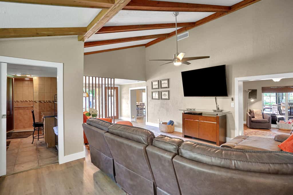 Riverfront retreat with pool spa outdoor kitchen firepit dock sauna and games
