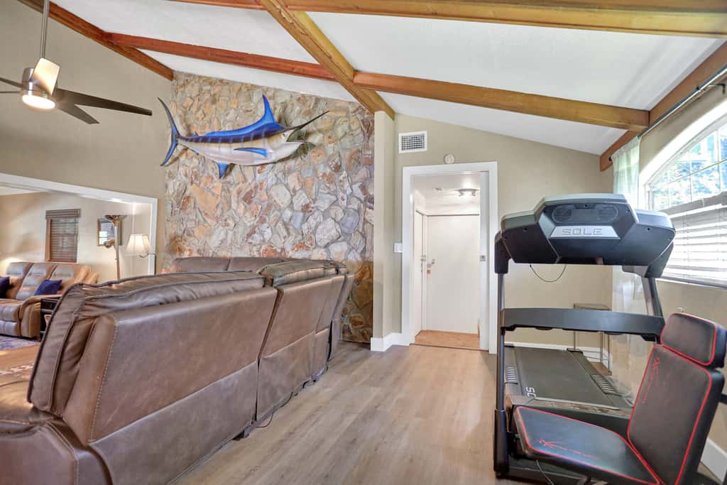 Riverfront retreat with pool spa outdoor kitchen firepit dock sauna and games