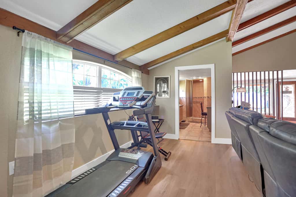 Riverfront retreat with pool spa outdoor kitchen firepit dock sauna and games