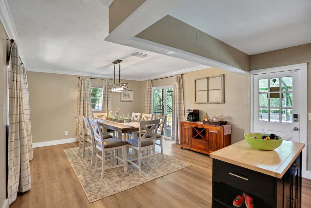 Riverfront retreat with pool spa outdoor kitchen firepit dock sauna and games