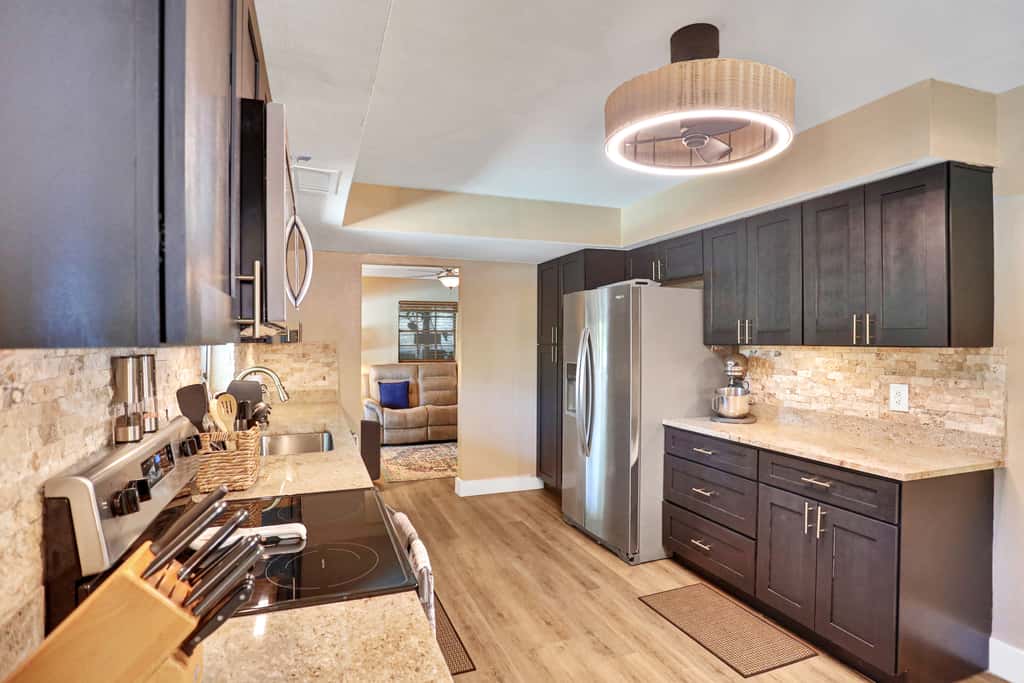 Riverfront retreat with pool spa outdoor kitchen firepit dock sauna and games
