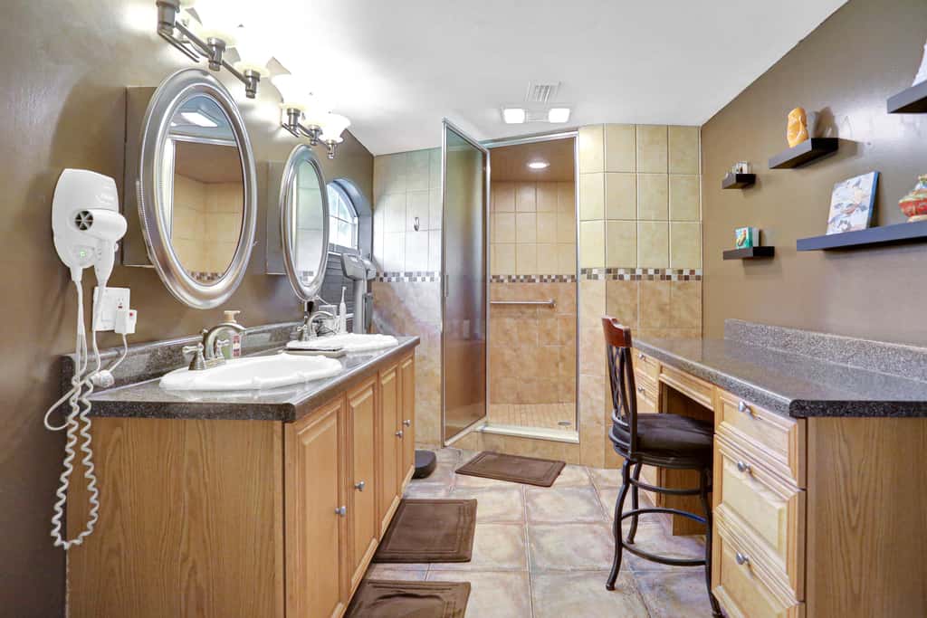 Riverfront retreat with pool spa outdoor kitchen firepit dock sauna and games