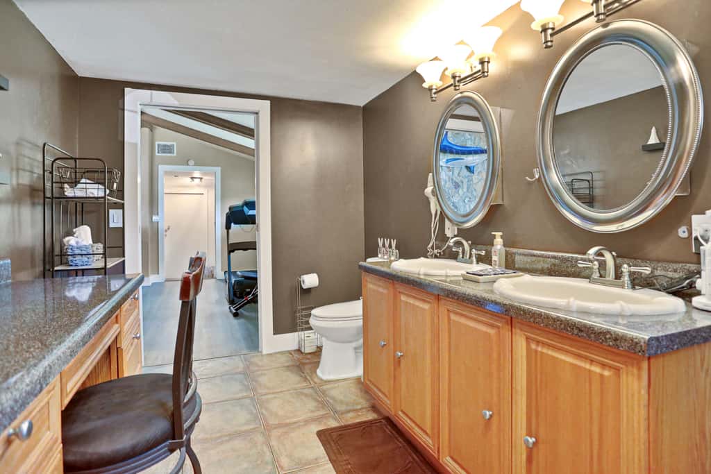 Riverfront retreat with pool spa outdoor kitchen firepit dock sauna and games