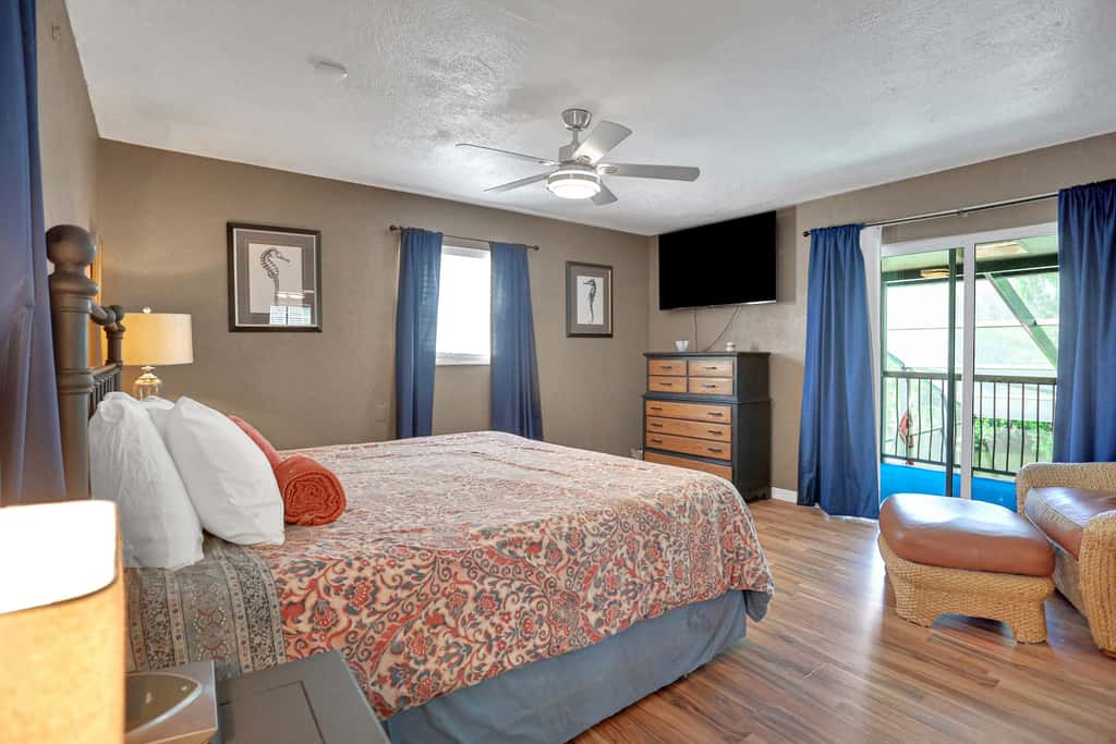 Riverfront retreat with pool spa outdoor kitchen firepit dock sauna and games