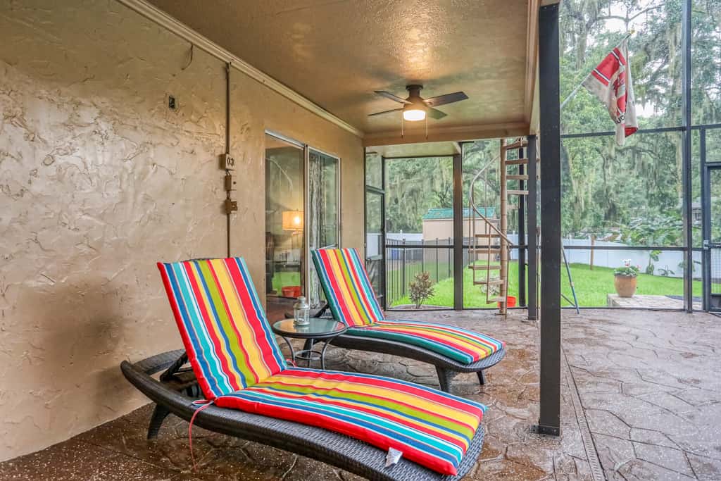 Riverfront retreat with pool spa outdoor kitchen firepit dock sauna and games