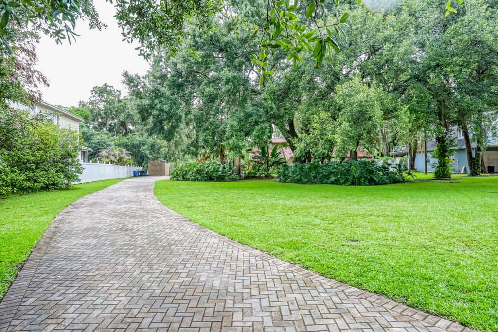 Riverfront retreat with pool spa outdoor kitchen firepit dock sauna and games