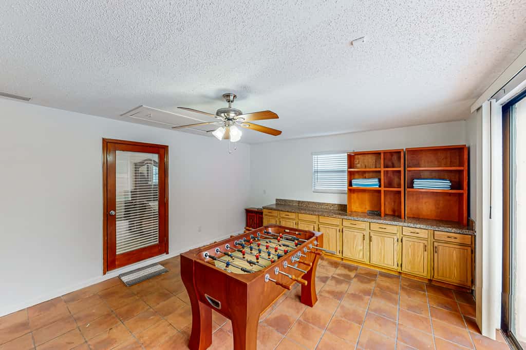 Conveniently located home with private pool patio foosball and private WD
