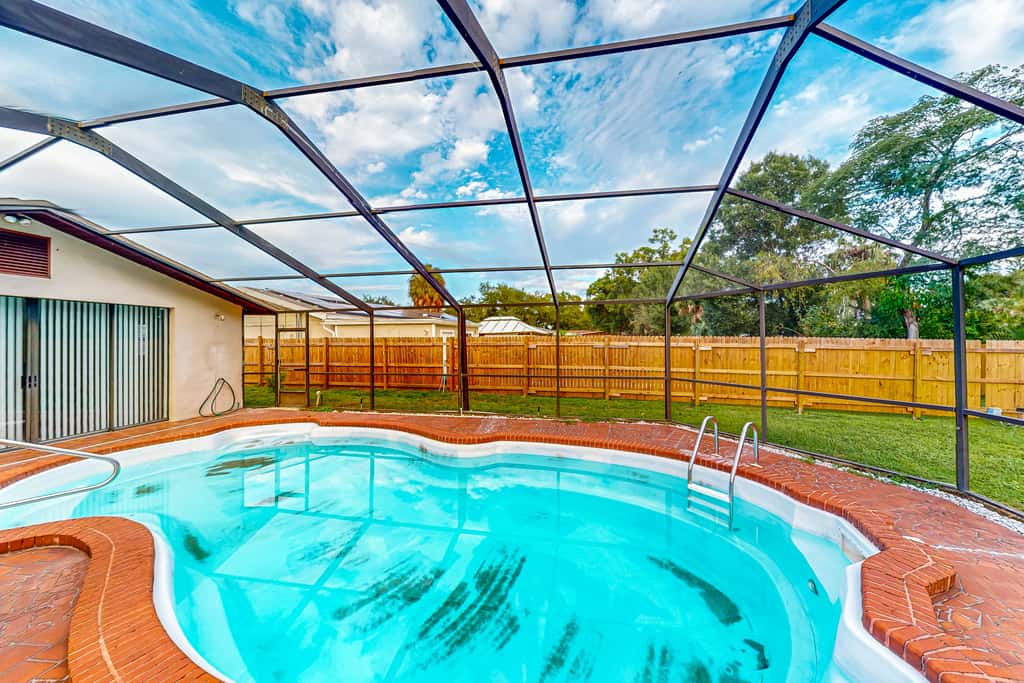 Conveniently located home with private pool patio foosball and private WD
