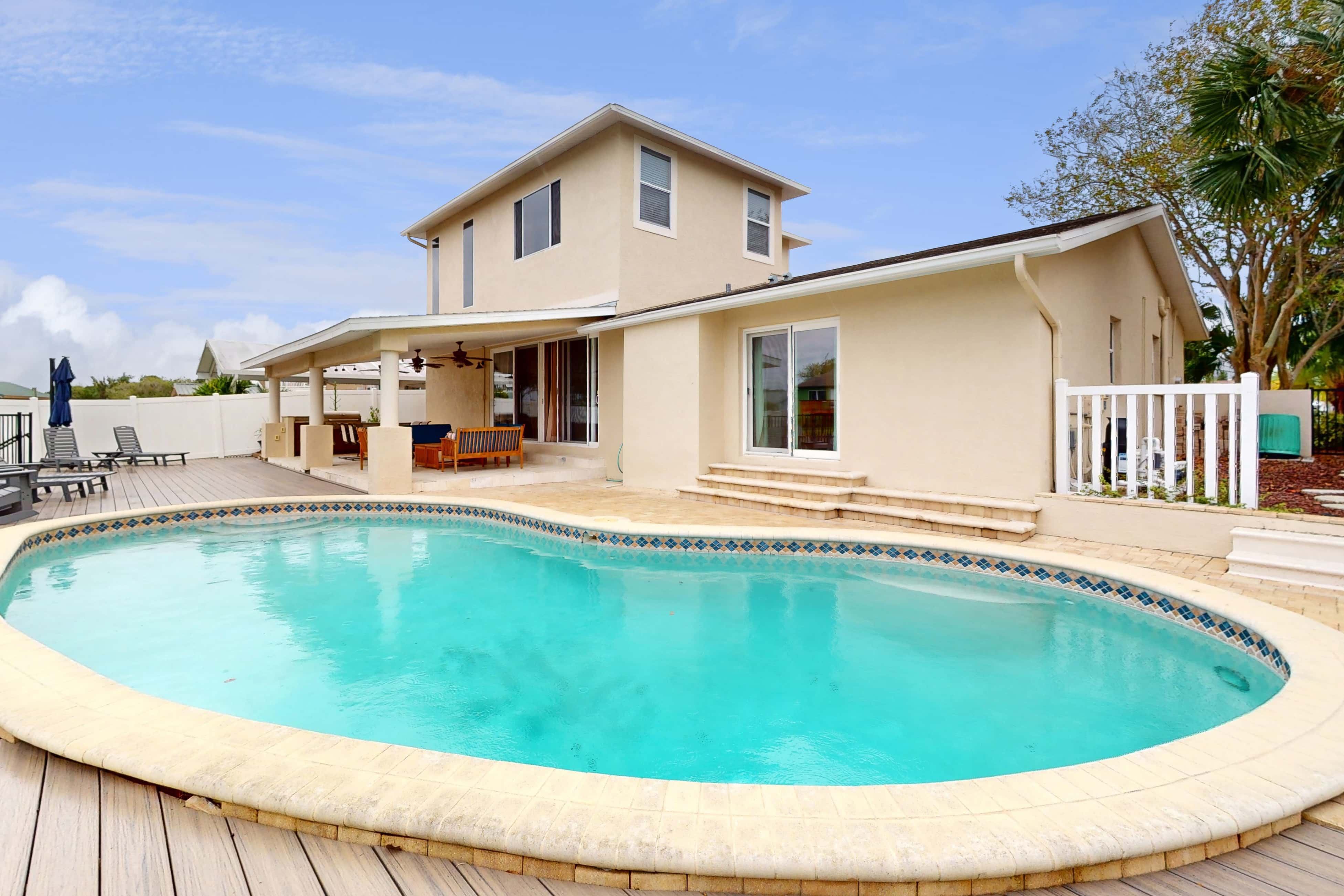 2 657 sq ft upscale canal home with pool dock and stunning main suite dog friendly