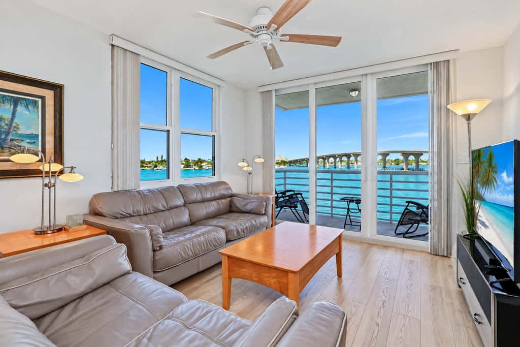 Water view condo with private beach pool and hot tub snowbird friendly