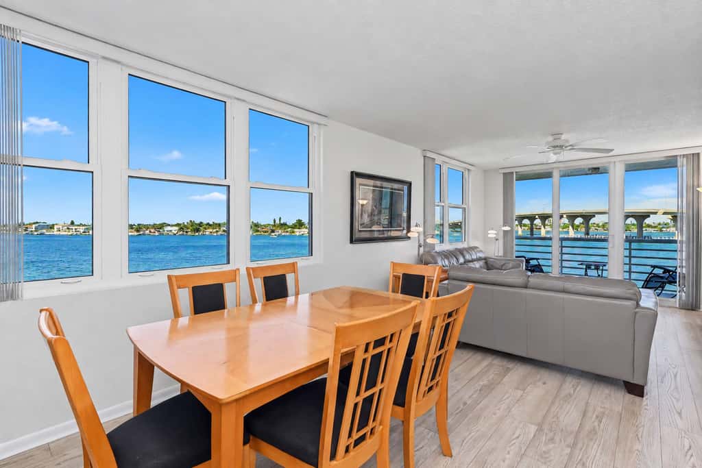 Water view condo with private beach pool and hot tub snowbird friendly