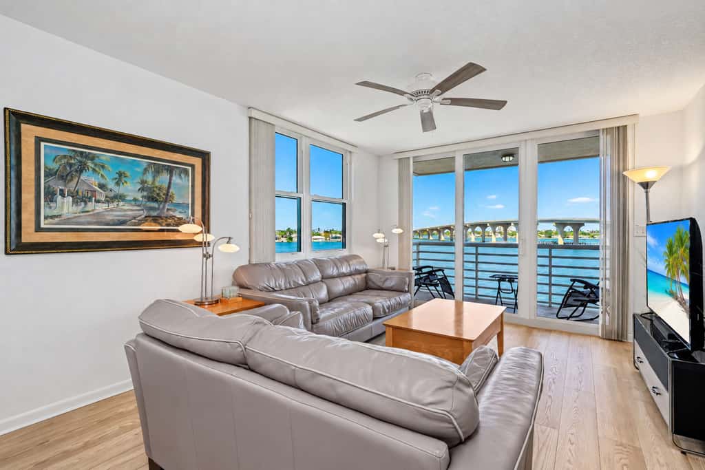 Water view condo with private beach pool and hot tub snowbird friendly