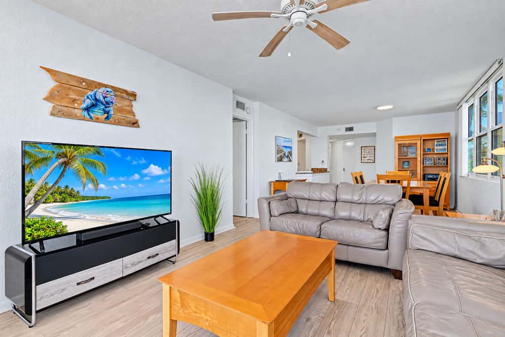 Water view condo with private beach pool and hot tub snowbird friendly