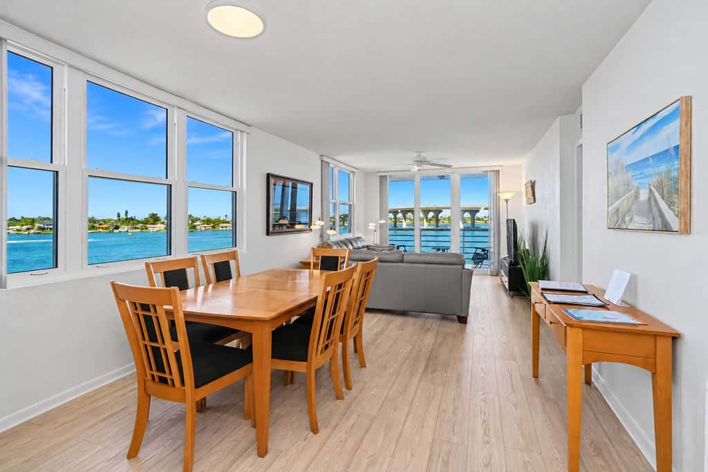 Water view condo with private beach pool and hot tub snowbird friendly