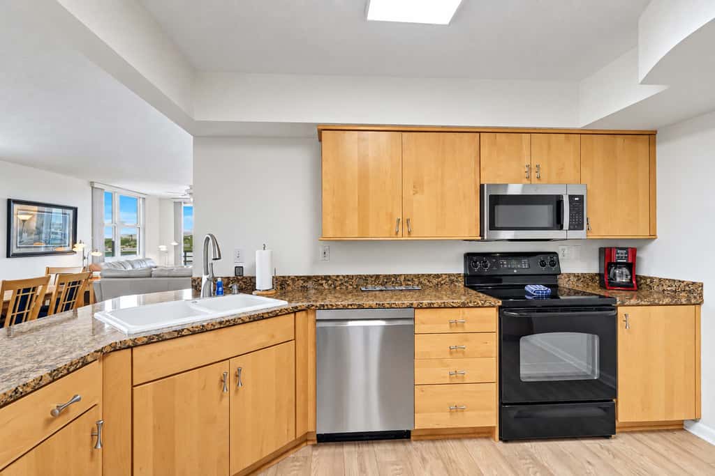 Water view condo with private beach pool and hot tub snowbird friendly