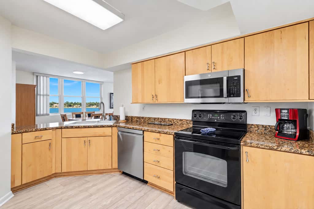 Water view condo with private beach pool and hot tub snowbird friendly