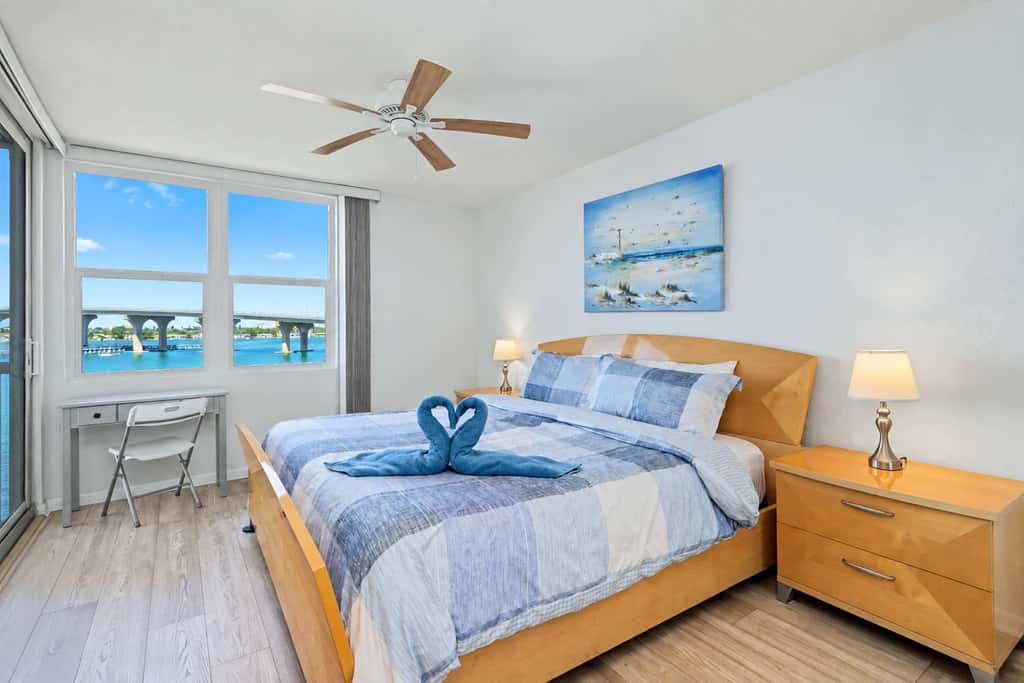 Water view condo with private beach pool and hot tub snowbird friendly