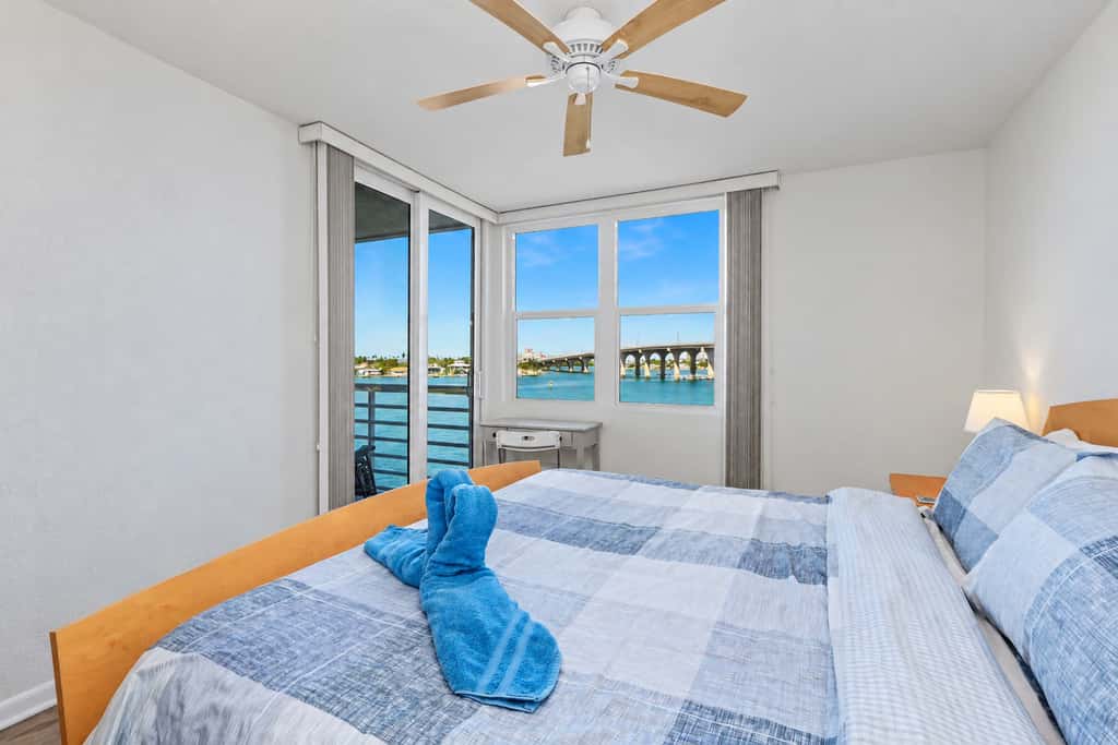 Water view condo with private beach pool and hot tub snowbird friendly