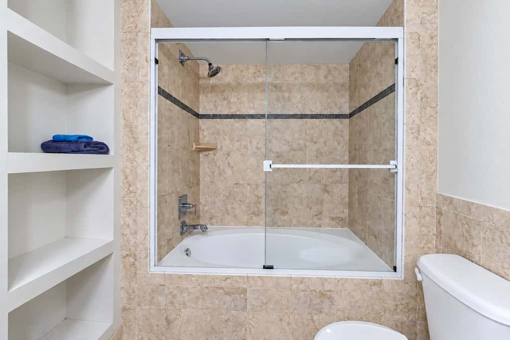 Water view condo with private beach pool and hot tub snowbird friendly