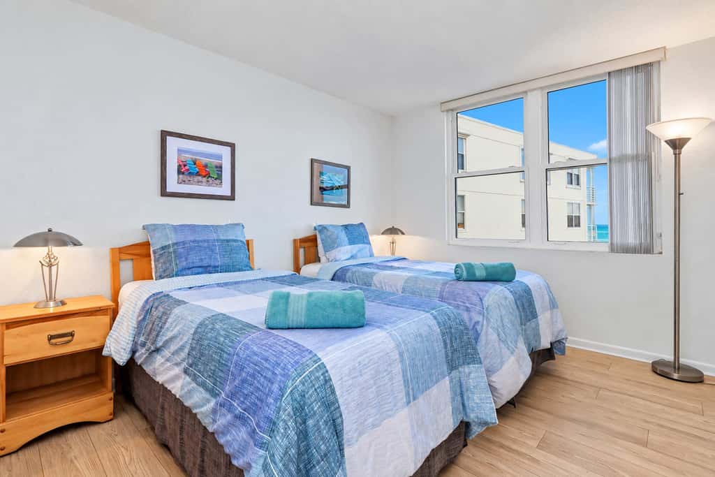 Water view condo with private beach pool and hot tub snowbird friendly