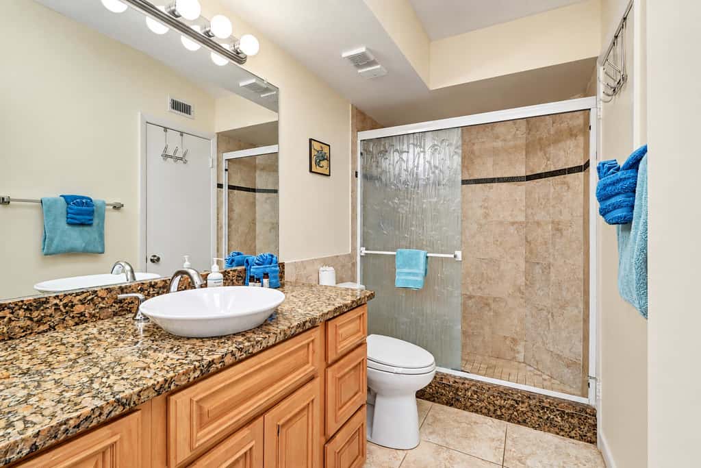 Water view condo with private beach pool and hot tub snowbird friendly