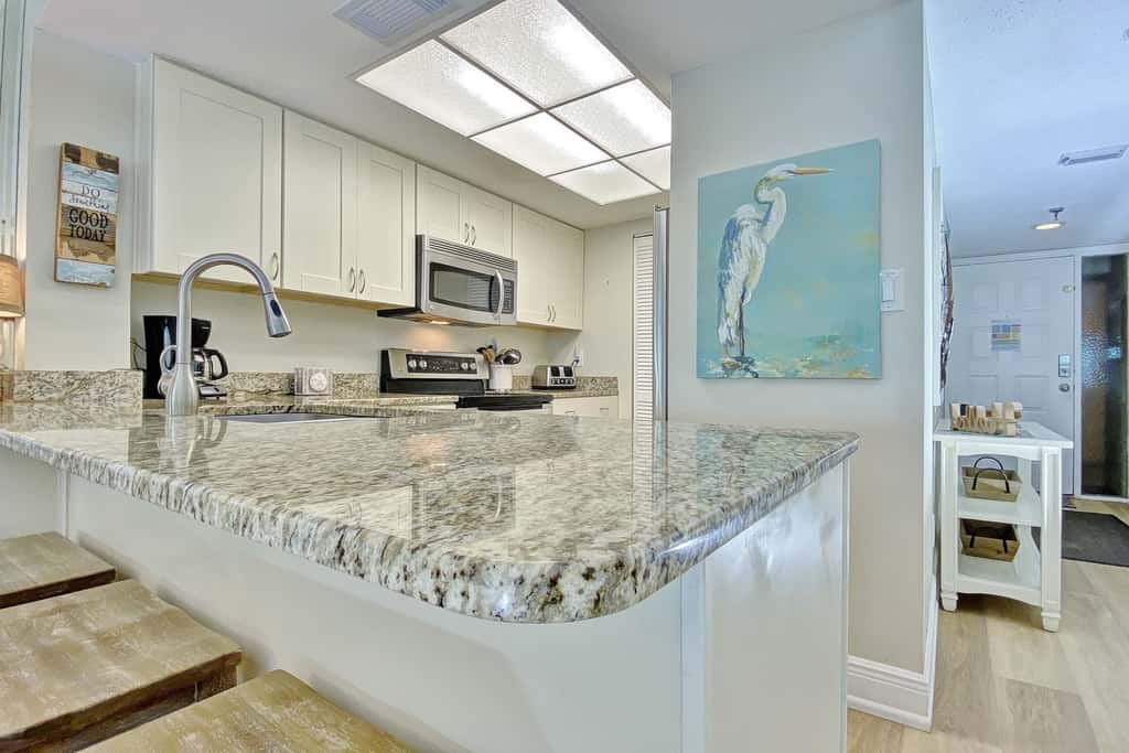 Peaceful Beachfront Escape w/Private Balcony, Heated pool & Spa