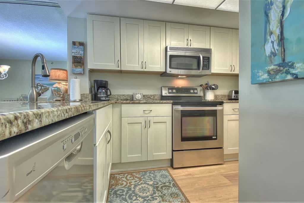 Peaceful Beachfront Escape w/Private Balcony, Heated pool & Spa