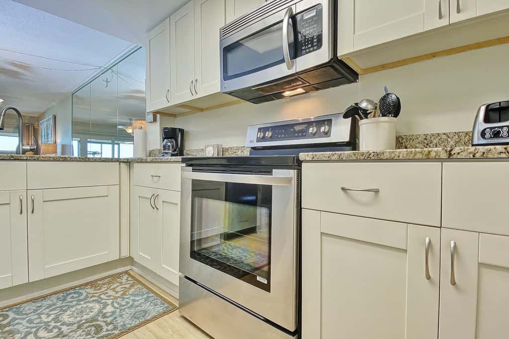 Peaceful Beachfront Escape w/Private Balcony, Heated pool & Spa