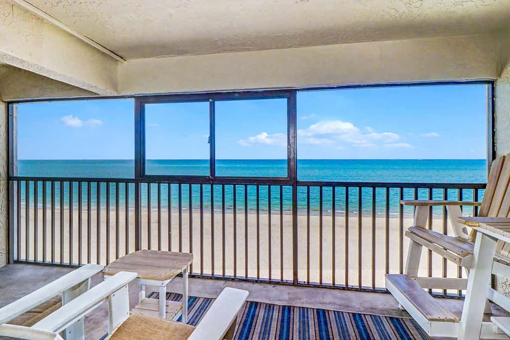 Peaceful Beachfront Escape w/Private Balcony, Heated pool & Spa