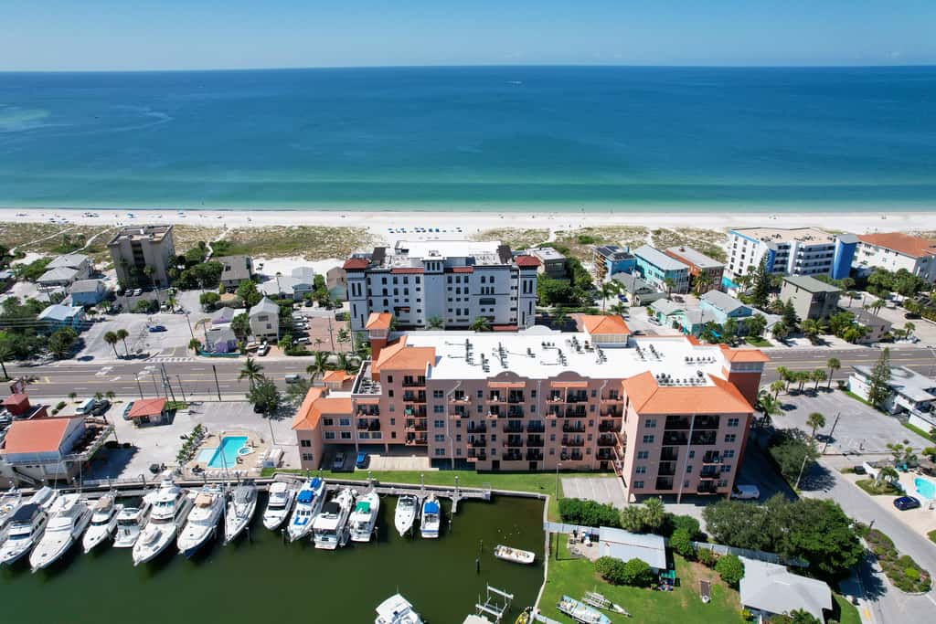 Intracoastal view condo with pool hot tub and marina access walk to beach