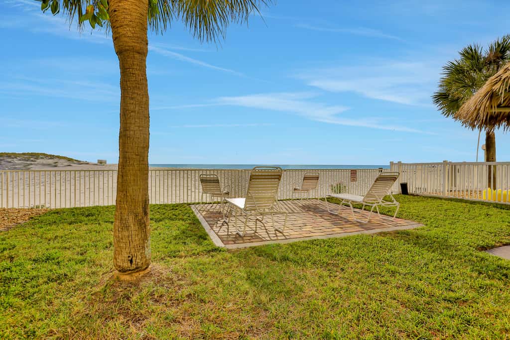 Top floor beachfront condo with Gulf views balcony pool hot tub and bocce