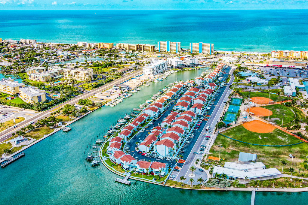 Water view condo with balcony grill heated pool hot tub and sauna walk to beach